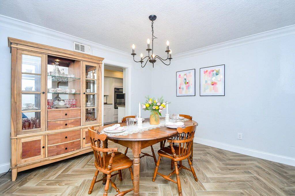 This beautiful wood-like tile is located here and throughout the 1st floor living areas.