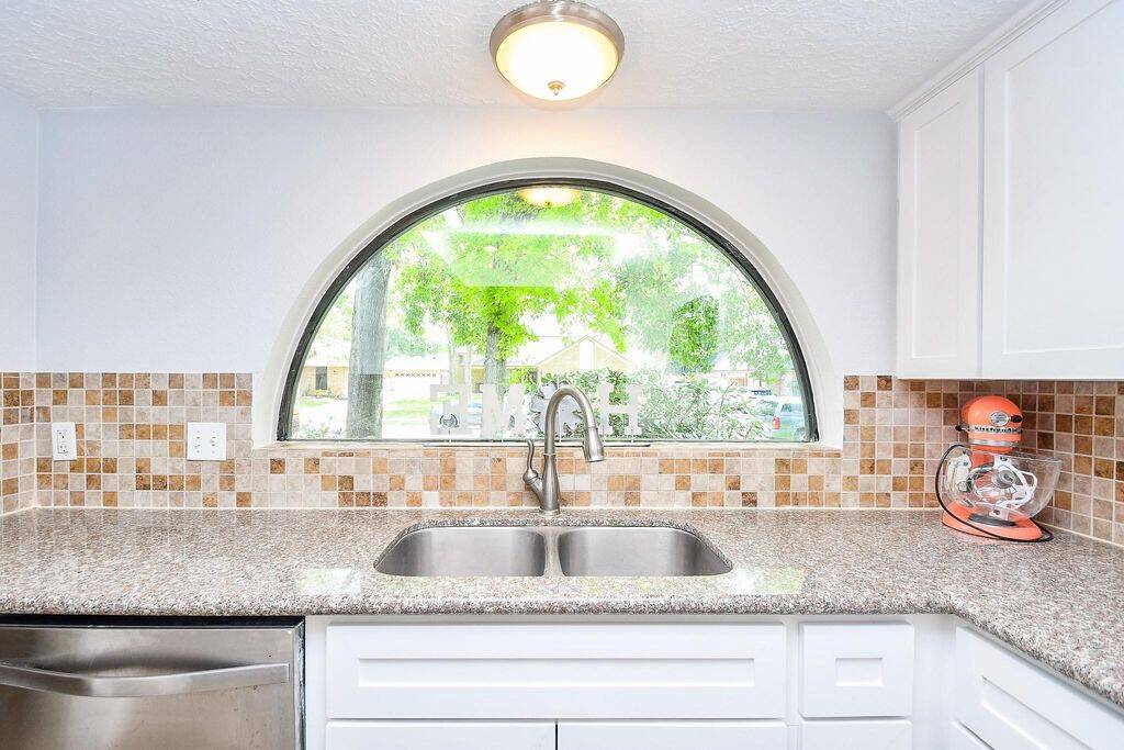 What a unique window over the sink!
