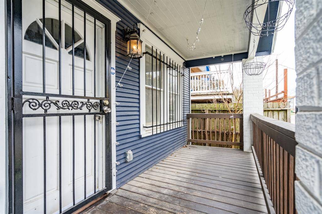 Spacious front porch to watch the neighborhood.