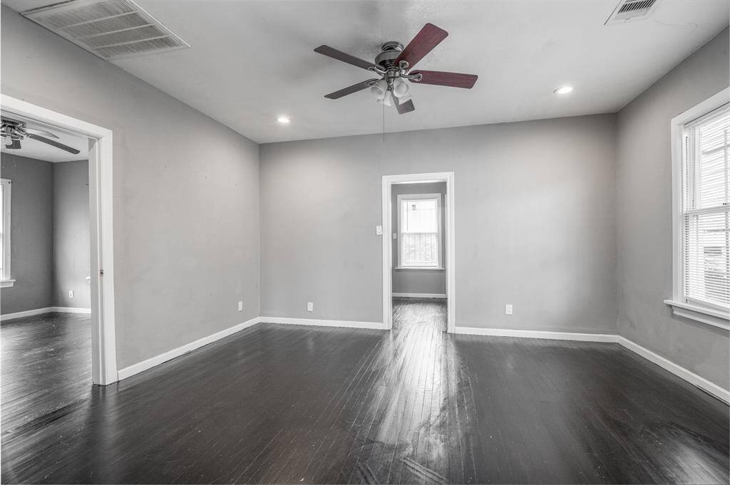 Dining area with door to back bedroom and kitchen