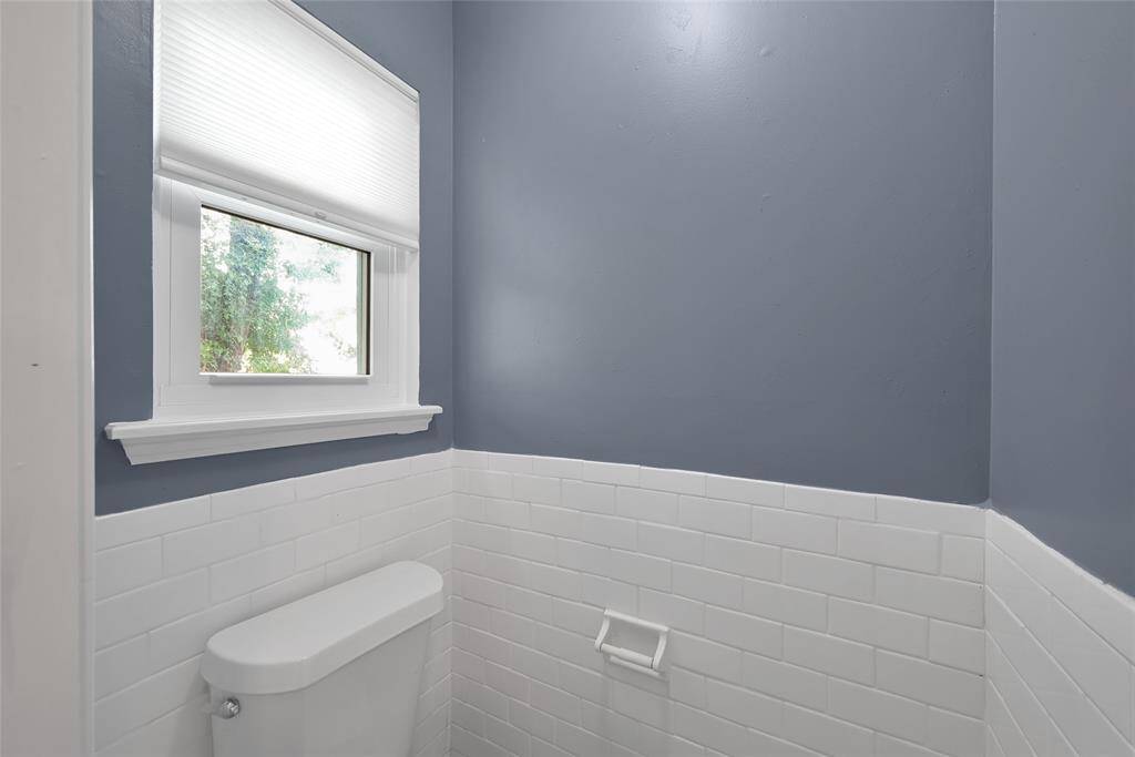 Half bath just off utility room.