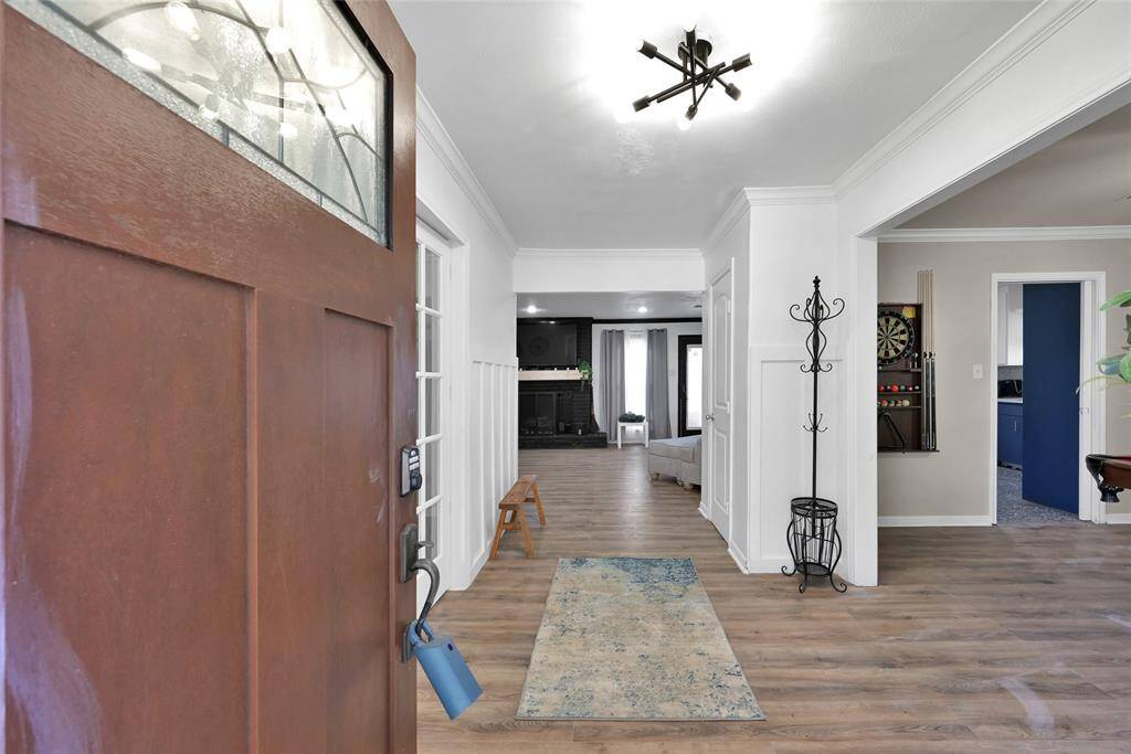 Upon entry into the home, you are greeted with line of sigh views to the back of the home. Formal dining room to the right and an office/flex space to the left.