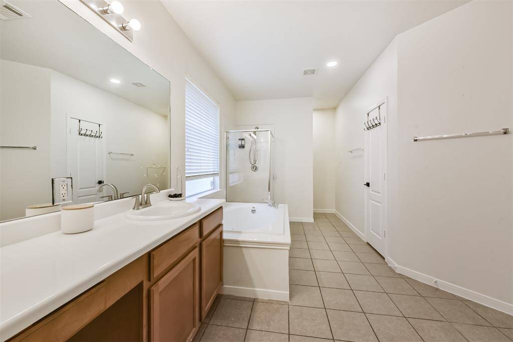 Primary Bath is spacious w/ vanity