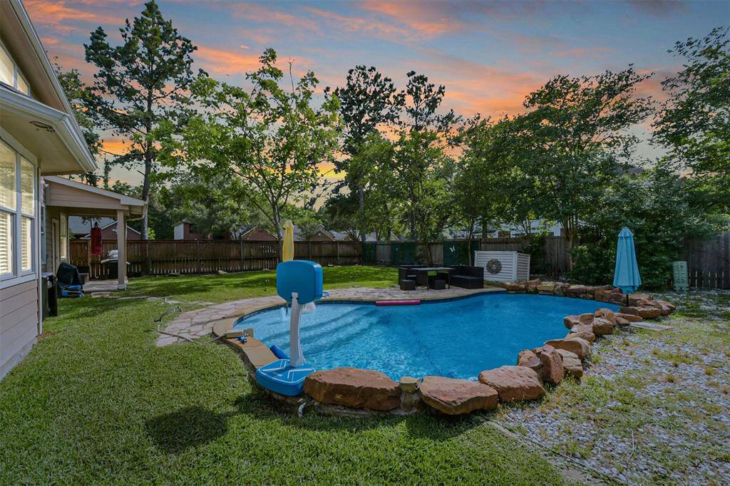 It's already getting hot! Enjoy the spacious backyard with Pool & plenty of room for the entire family.