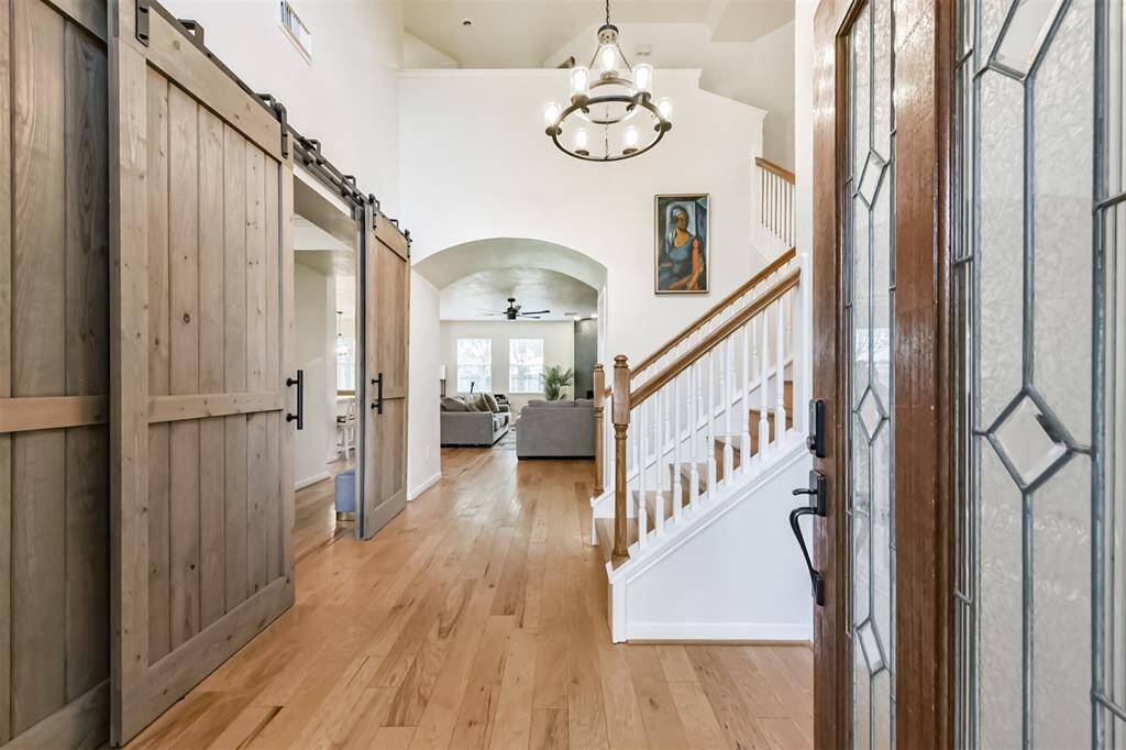 Your home greets you with High-end, Soft-feel Engineered Wood flooring.