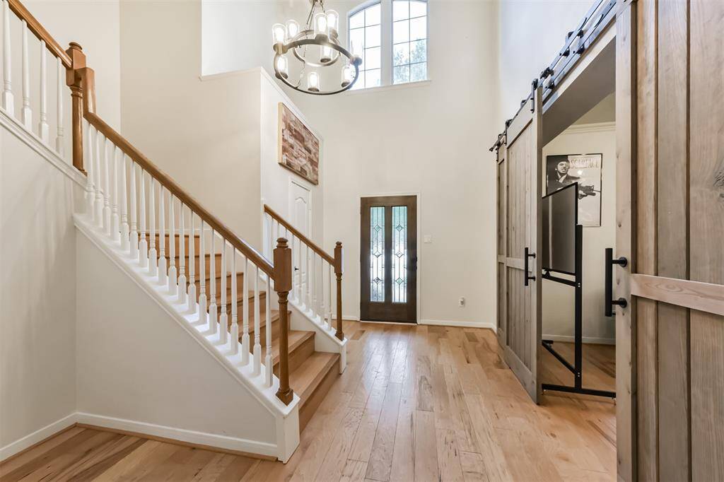 2 story, lots of natural light Foyer.  New Elegant Barn doors to Study.