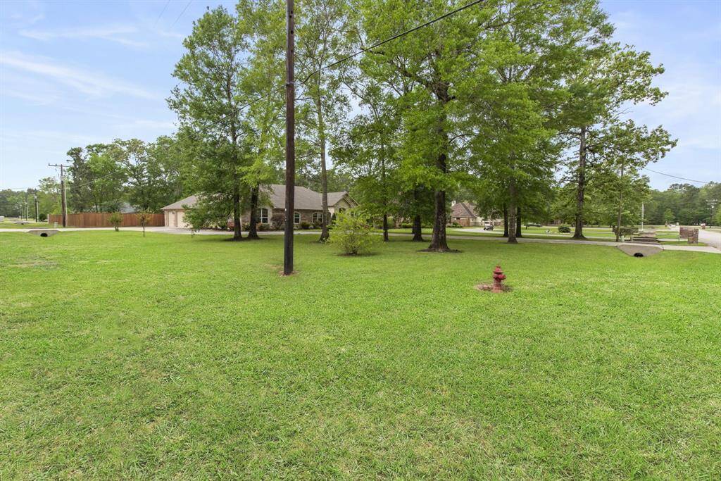 huge corner lot perfectly located