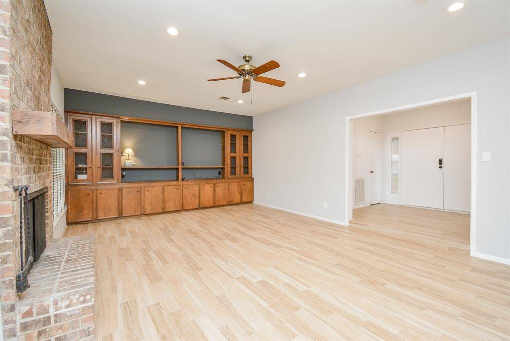 VIEW FROM THE DINING ROOM INTO THE FAMILY ROOM