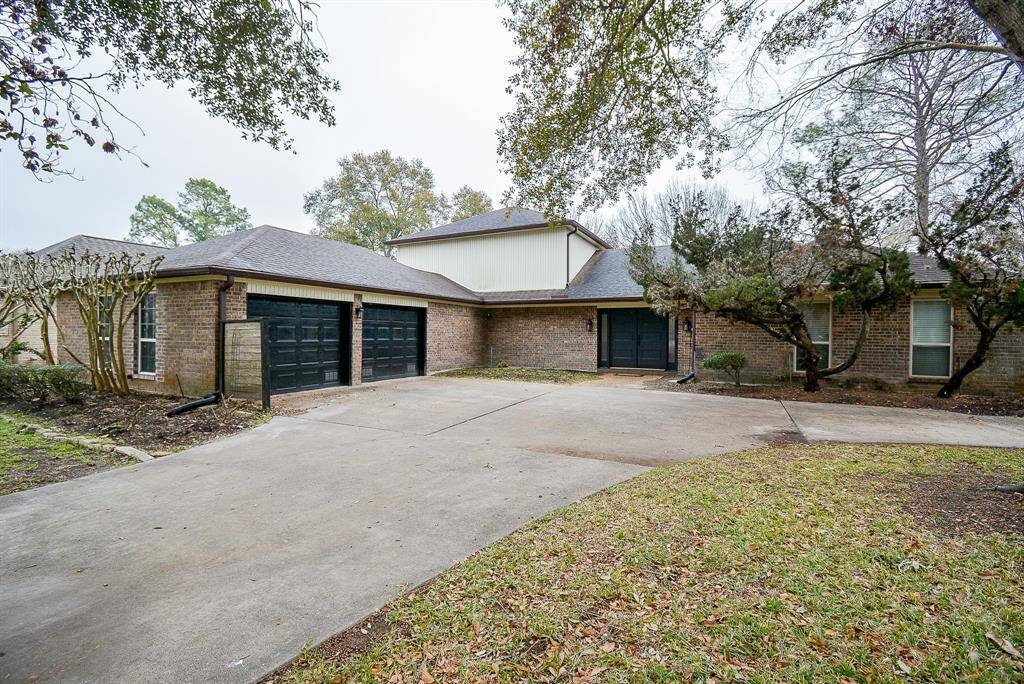 DEEP WIDE DRIVEWAY WITH OVERSIZED GARAGE