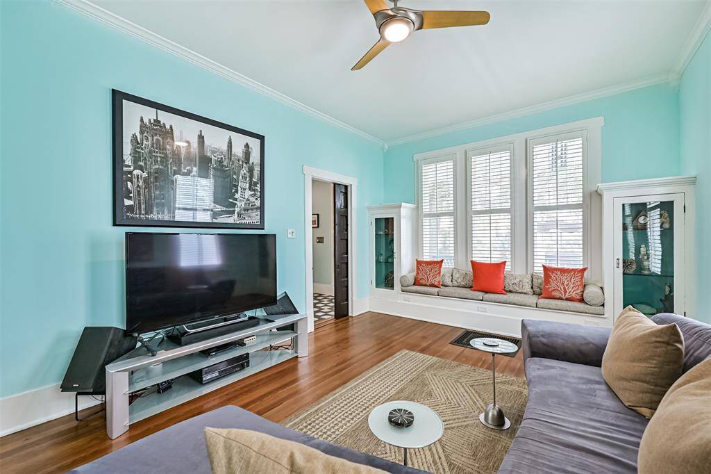 Gorgeous built-ins located under the front windows.