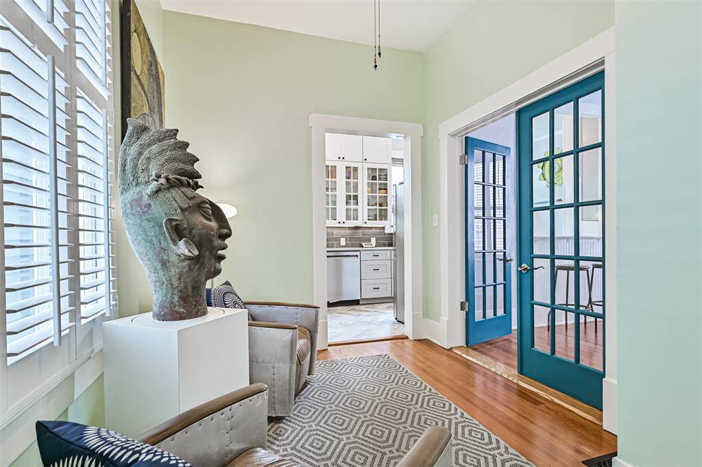 Bonus Room. (Interior custom shutter shades transfer with the property.)