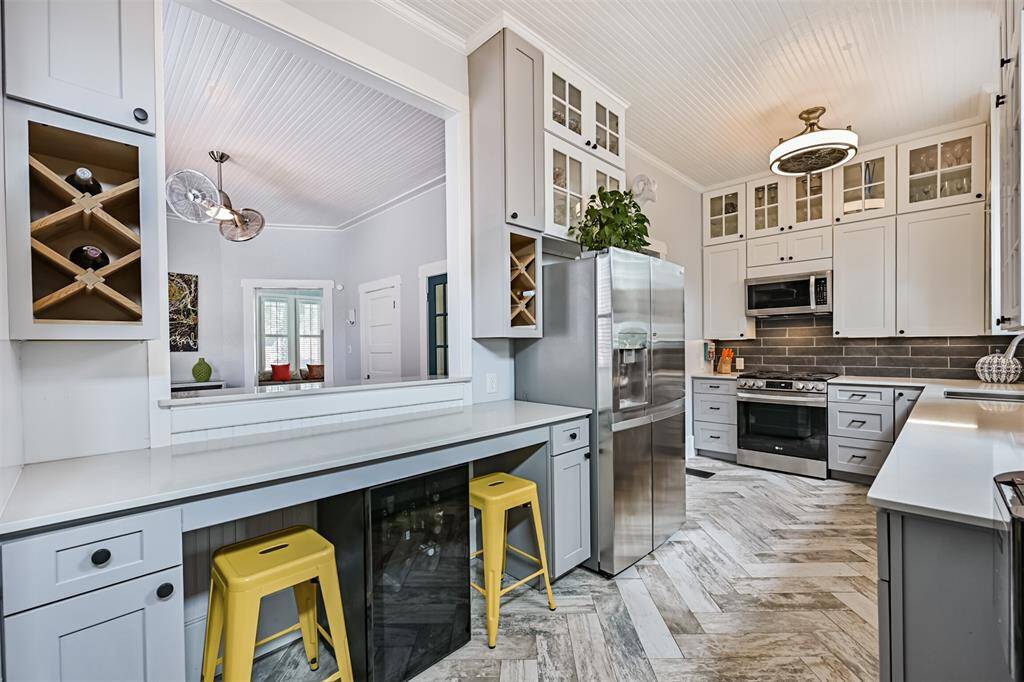 View of bar area & wine/beverage cooler (included in sale).