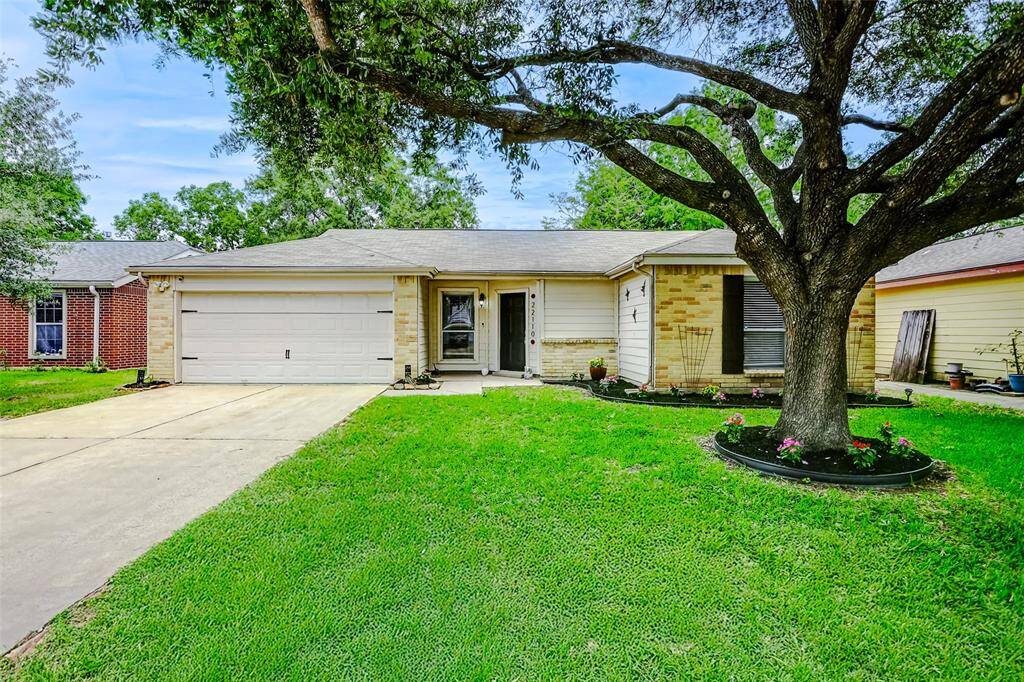Beautiful curb appeal with lush green grass