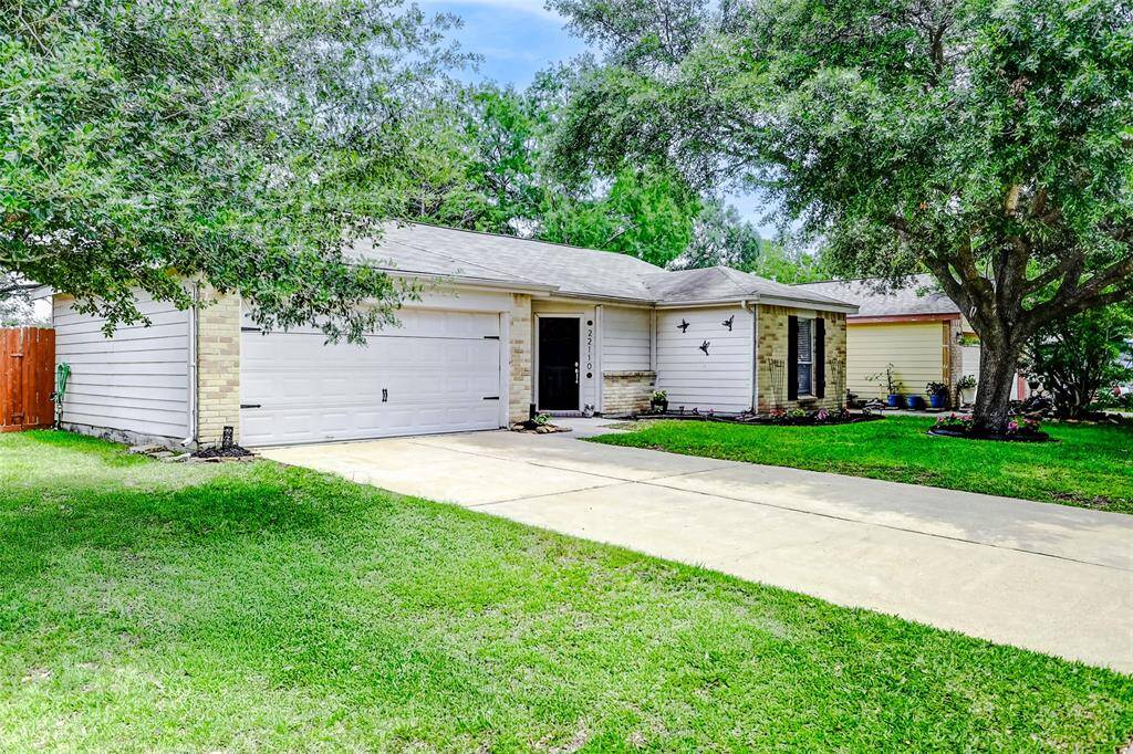 Long double driveway for plenty of parking with 2 car garage