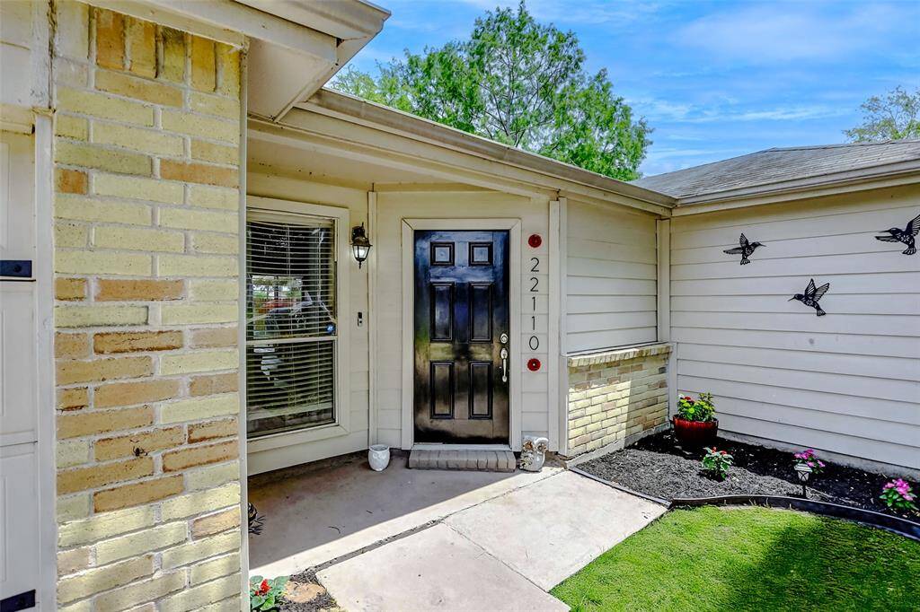Front Door Entry with inviting garden area