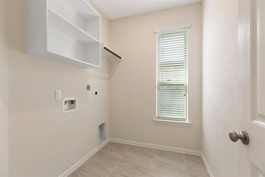 Nice laundry room with window
