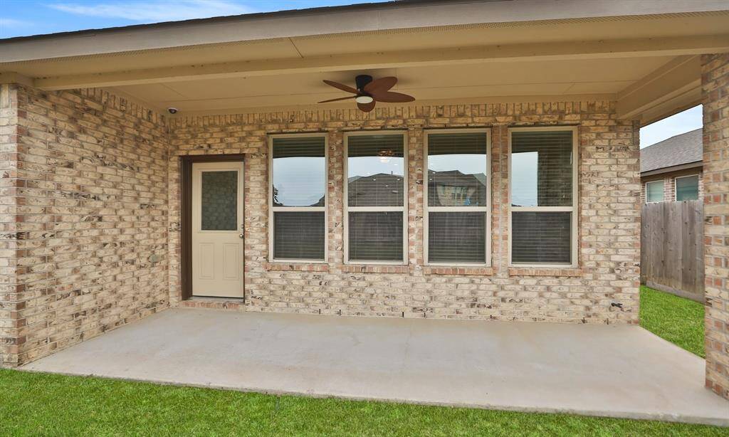 Covered patio with new ceiling fan