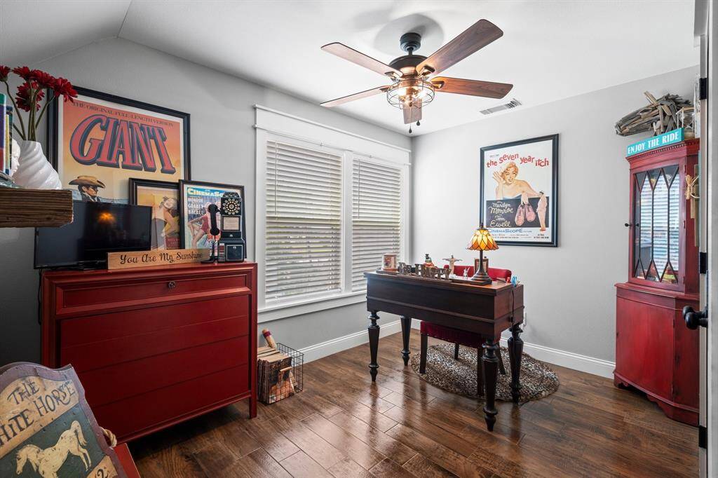 Bedroom #4 located upstairs and adjacent to Bedroom #3. As you can see, this room is a perfect office as well! Who in your family needs a handy home office?