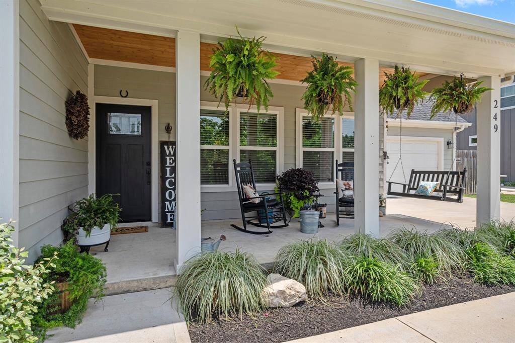 Who doesn't love a beautiful country front porch with amazing wood plank ceiling? Imagine yourself sitting in the swing sipping on some lemonade or a nice glass of wine! Great memories are made on a porch like this.