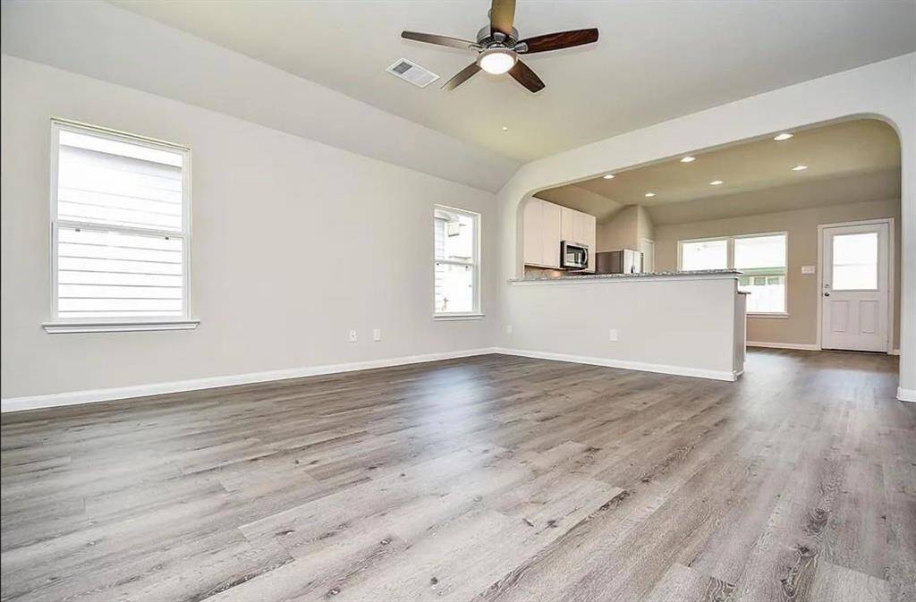 Open concept connects dining and living areas seamlessly.