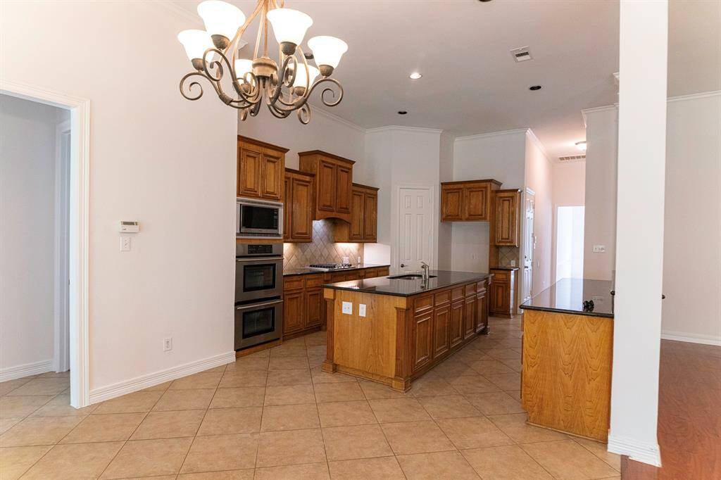 Breakfast area off  kitchen Love the natural light.