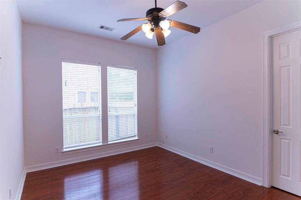 Bedroom 3, bright natural light, closet space connects with Primary closet.
