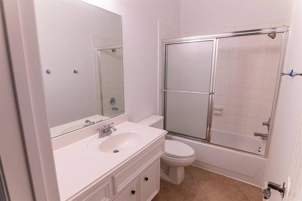Full Bathroom located next to 2/3 Bedrooms