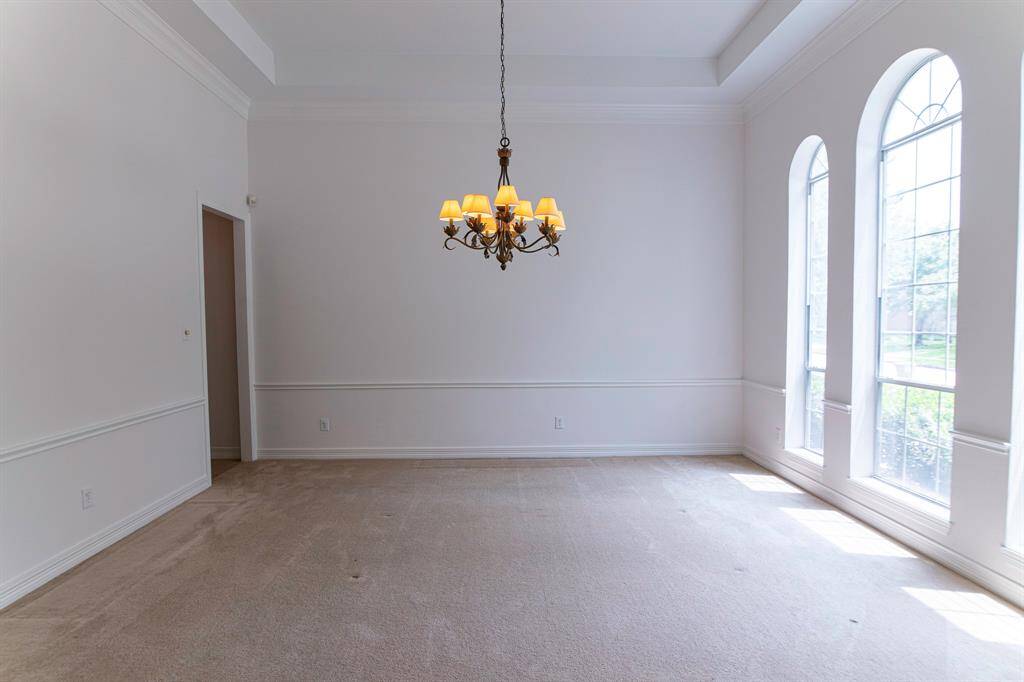 Formal Dinning connecting with Powder room and butlers pantry.