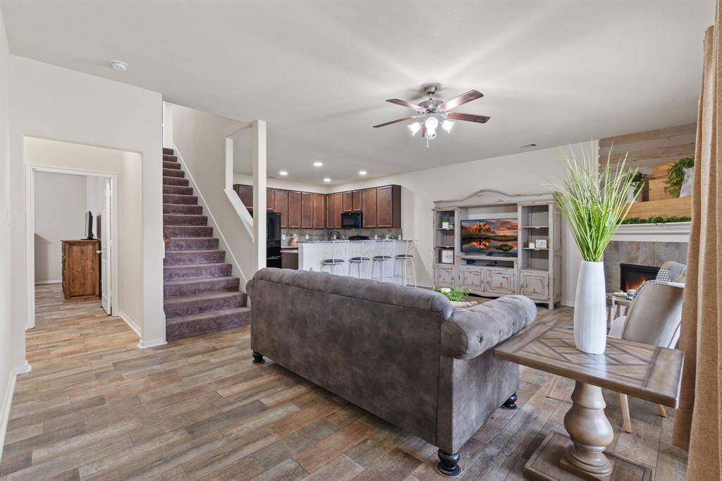 From here, you can see a peak of the primary bedroom settled down the hall and tucked away for privacy.