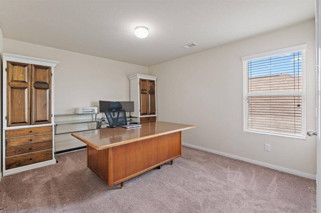 Secondary bedroom number 1 is being used as an office currently.