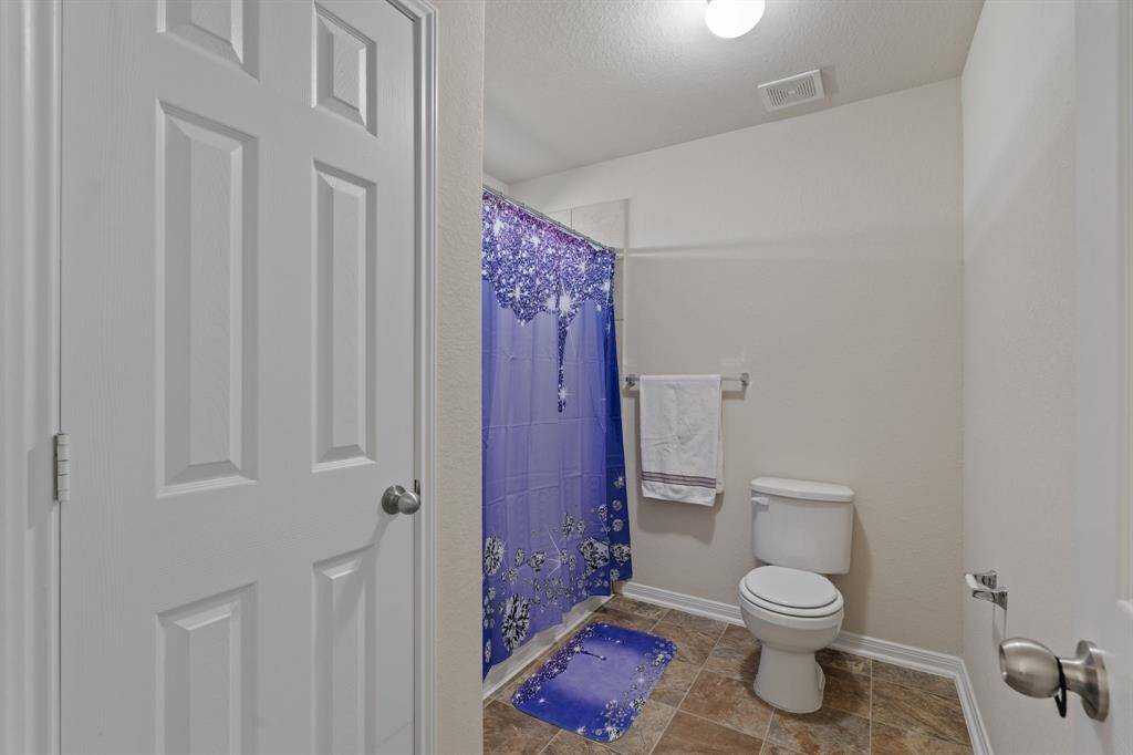 Also in this room is a linen storage closet.