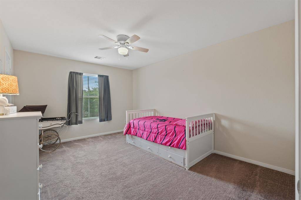 The 3rd of the secondary bedrooms overlooks the front driveway.