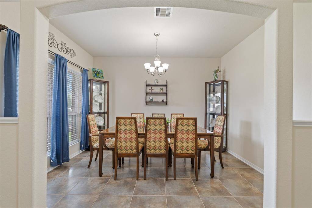 Just inside the front door is the formal dining room.
