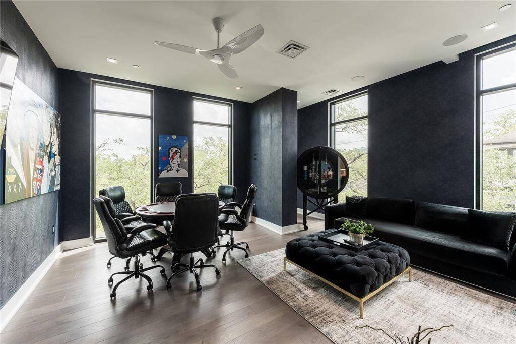 Spacious secondary bedroom ensuite corner unit featuring abundant natural light from numerous windows.