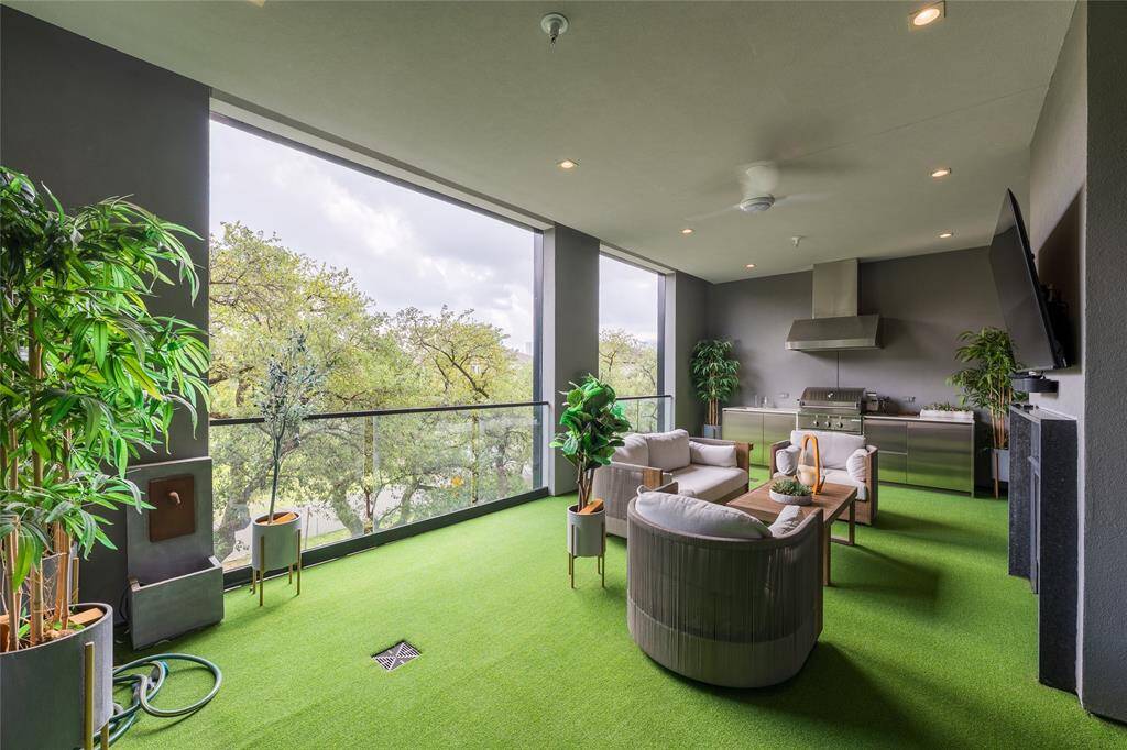 Experience a tranquil escape on the fully turfed, private treetop balcony—an urban oasis designed for elegant outdoor living. Complete with a discreet water hose and integrated drainage, it effortlessly accommodates curated greenery and pet-friendly indulgence.