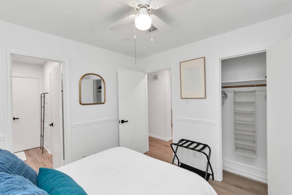 The secondary bedroom features plenty of space for furniture and personal touches.
