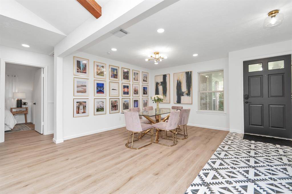 Recently updated in 2022, this home boasts wide-plank white oak floors, vaulted ceilings, and an open layout perfect for entertaining. The blend of modern finishes with classic charm creates an inviting space to relax and enjoy.