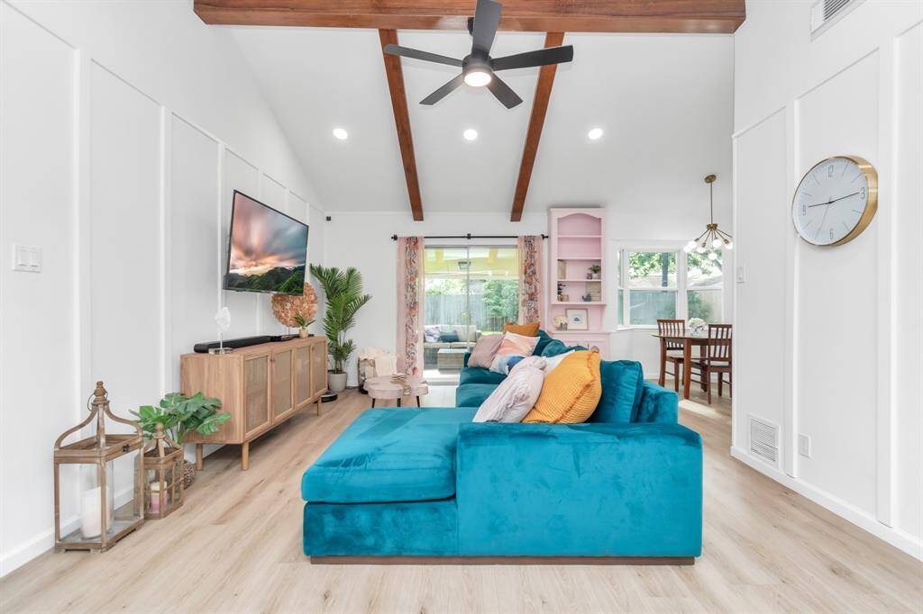 The space feels both spacious and intimate, making it ideal for everything from cozy nights to hosting friends and family.
