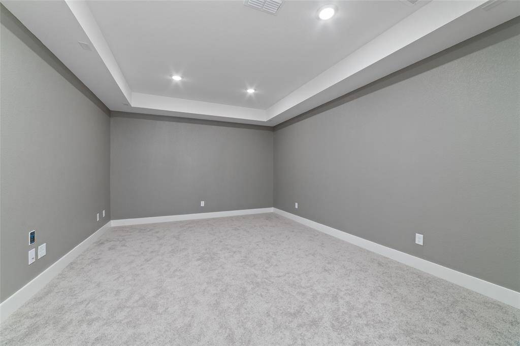 Cozy media room perfect for movie nights or gaming.