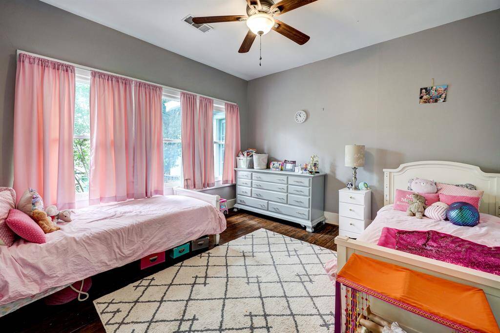 One of the two secondary bedrooms on the first floor. *Photos are from a previous listing and may not reflect the property's current condition.