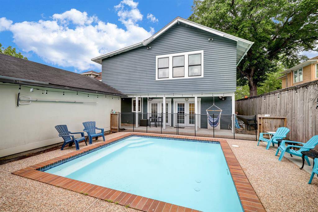 Another view of the pool and the back of the house.