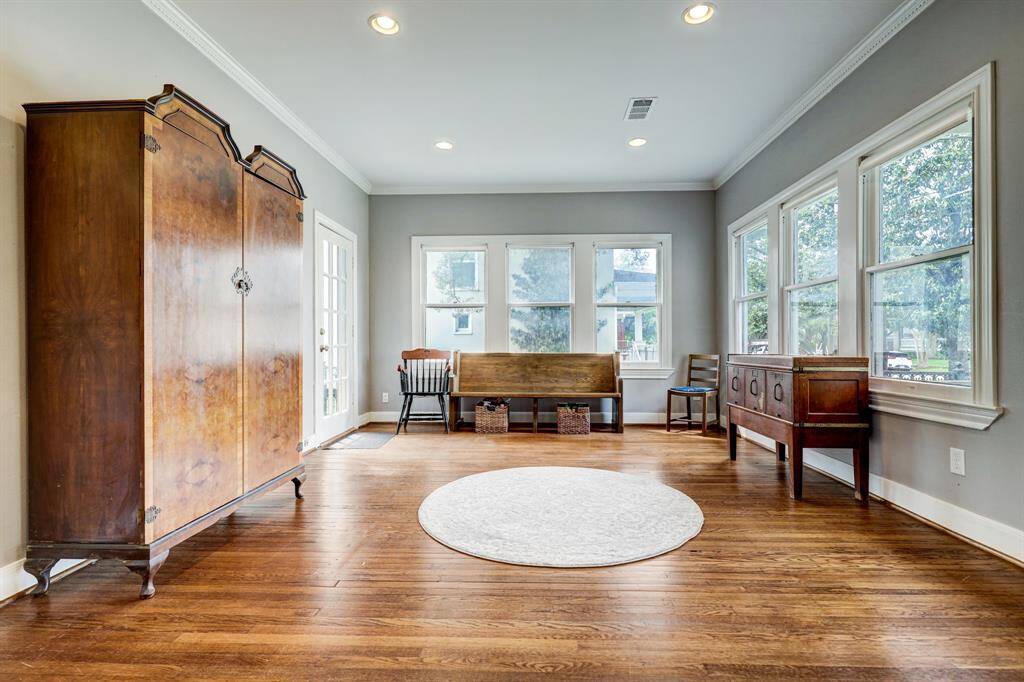 You will find the formal living room as you enter the home. Original hardwood flooring throughout. *Photos are from a previous listing and may not reflect the property's current condition.