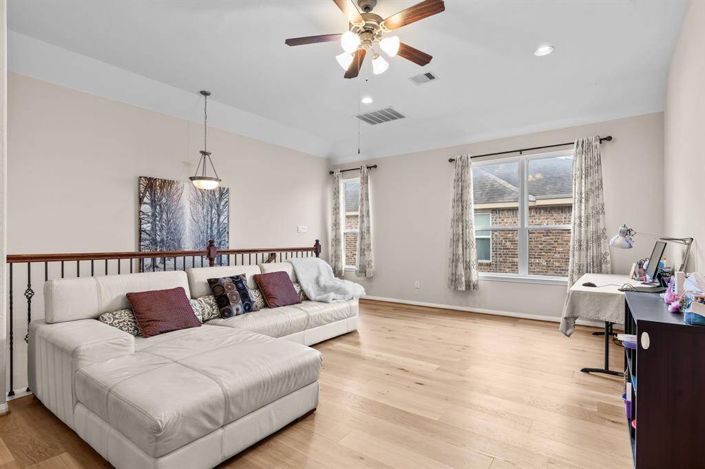 Spacious Game room upstairs can be used as living room.