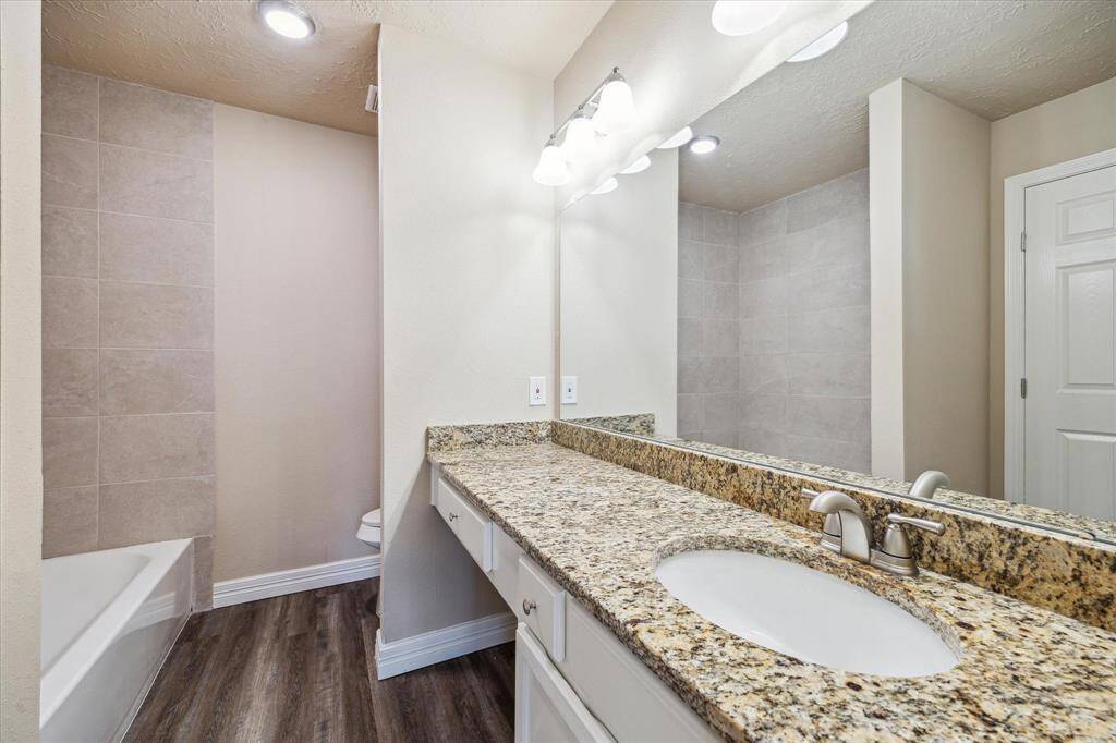 Expansive countertop space offers functionality and style.