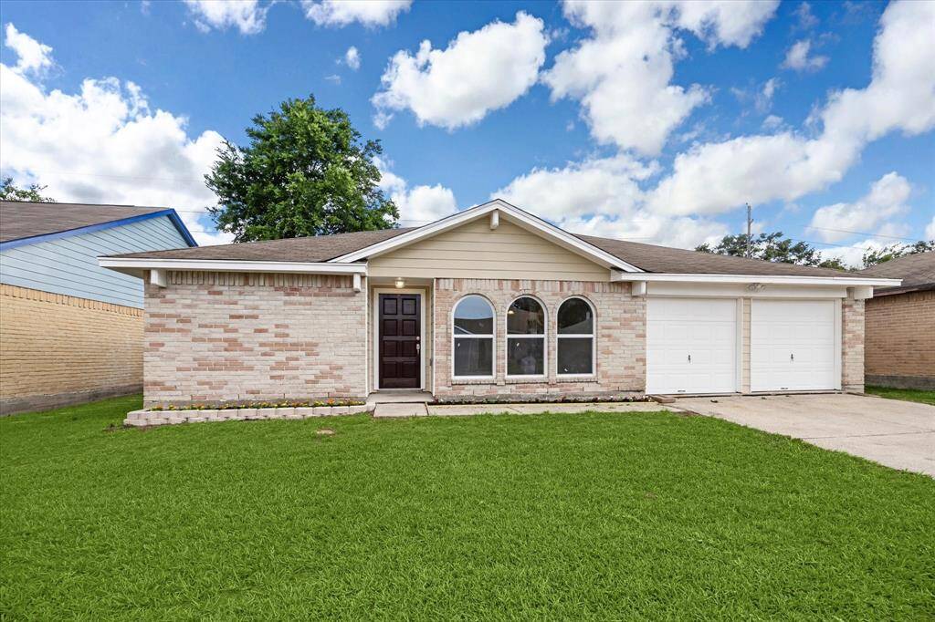 Welcome to 3519 Hombly Road, where vibrant flowers greet you at this charming home.