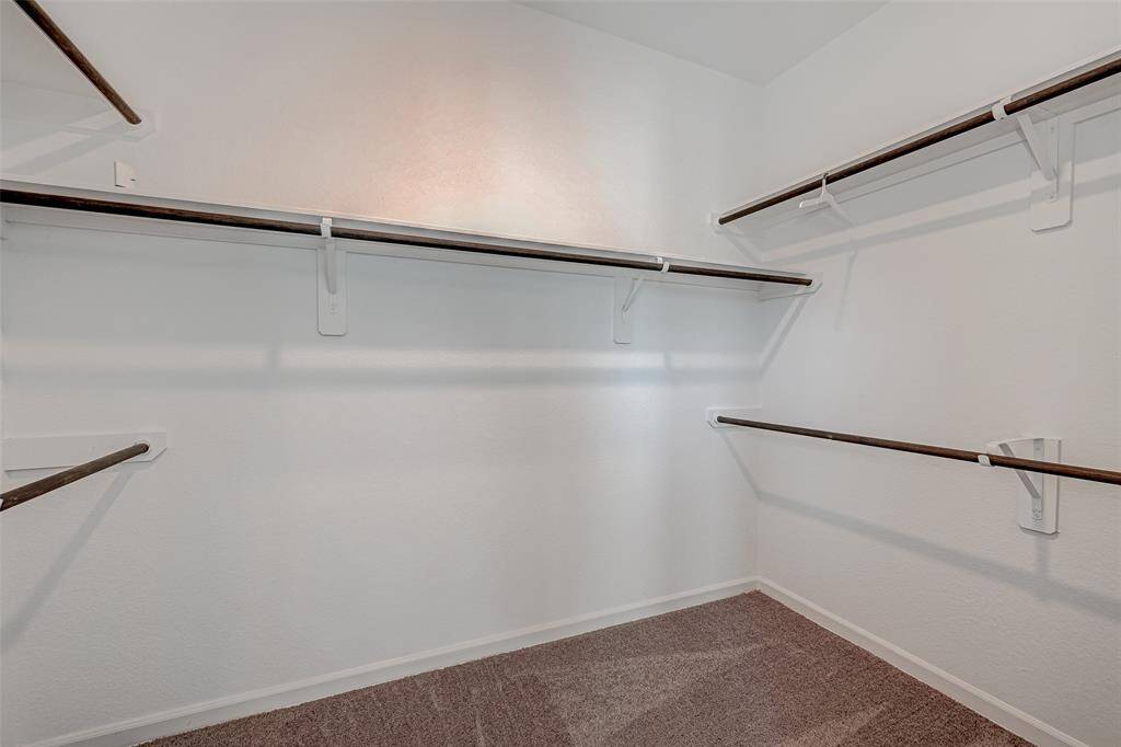 This is the large walk-in closet in the primary bedroom.