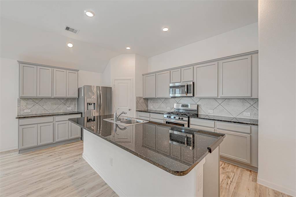 SS appliances stay with lease. Great sized corner pantry.