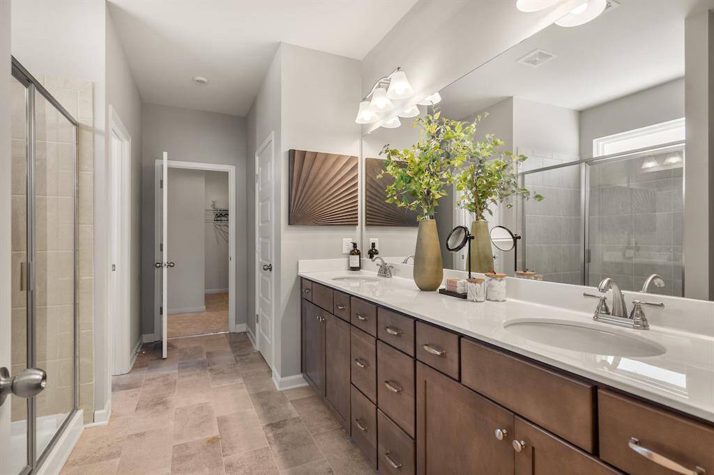 The James- Primary Bathroom. Home under construction. Sample floor plan photo used for illustrative purposes only. Upgrades, selections options, windows and colors may vary.