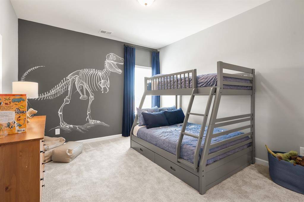 The James- Secondary Bedroom Upstairs. Home under construction. Sample floor plan photo used for illustrative purposes only. Upgrades, selections options, windows and colors may vary. under construction. Sample floor plan photo used for illustrative purposes only. Upgrades, selections options, windows and colors may vary.