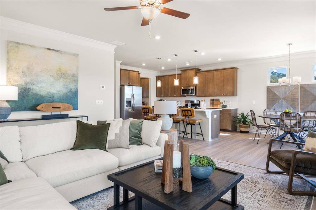 The James- Family Room. Home under construction. Sample floor plan photo used for illustrative purposes only. Upgrades, selections options, windows and colors may vary.